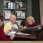 Sharing a good book in the library